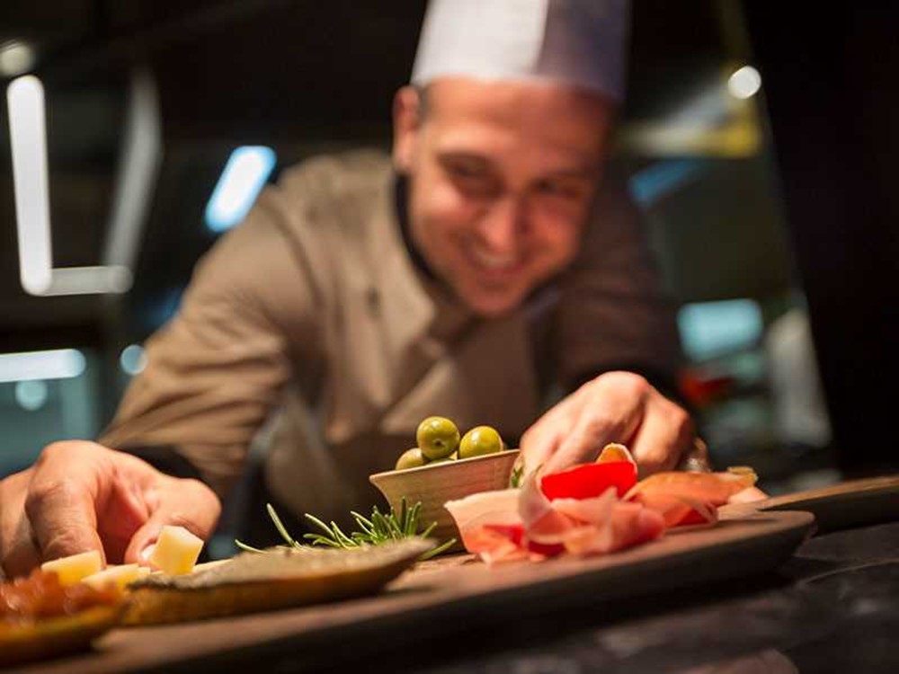 A tablet with [PLACES] by Valamar on the screen